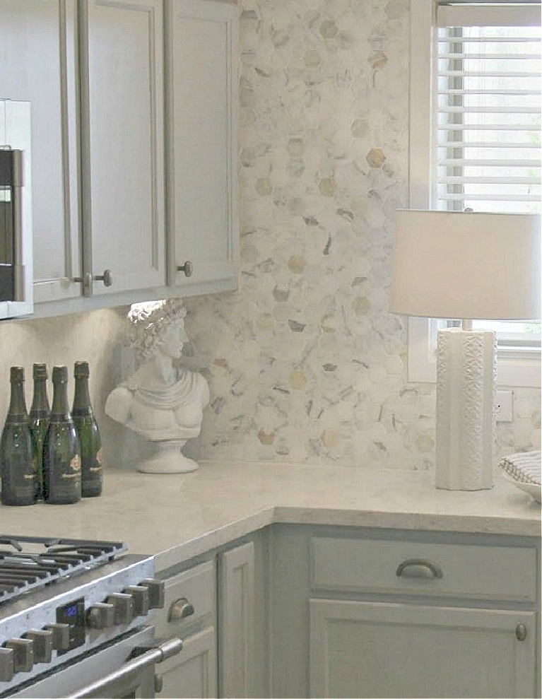 Hello Lovely's Kitchen Makeover with Viatera Soprano quartz counters, Kitchenaid stainless appliances, and blue grey cabinets. #hellolovelystudio #kitchenmakeover #diykitchendesign #paintedcabinets #viaterasoprano #whitequartzcounters #kitchenaidappliances