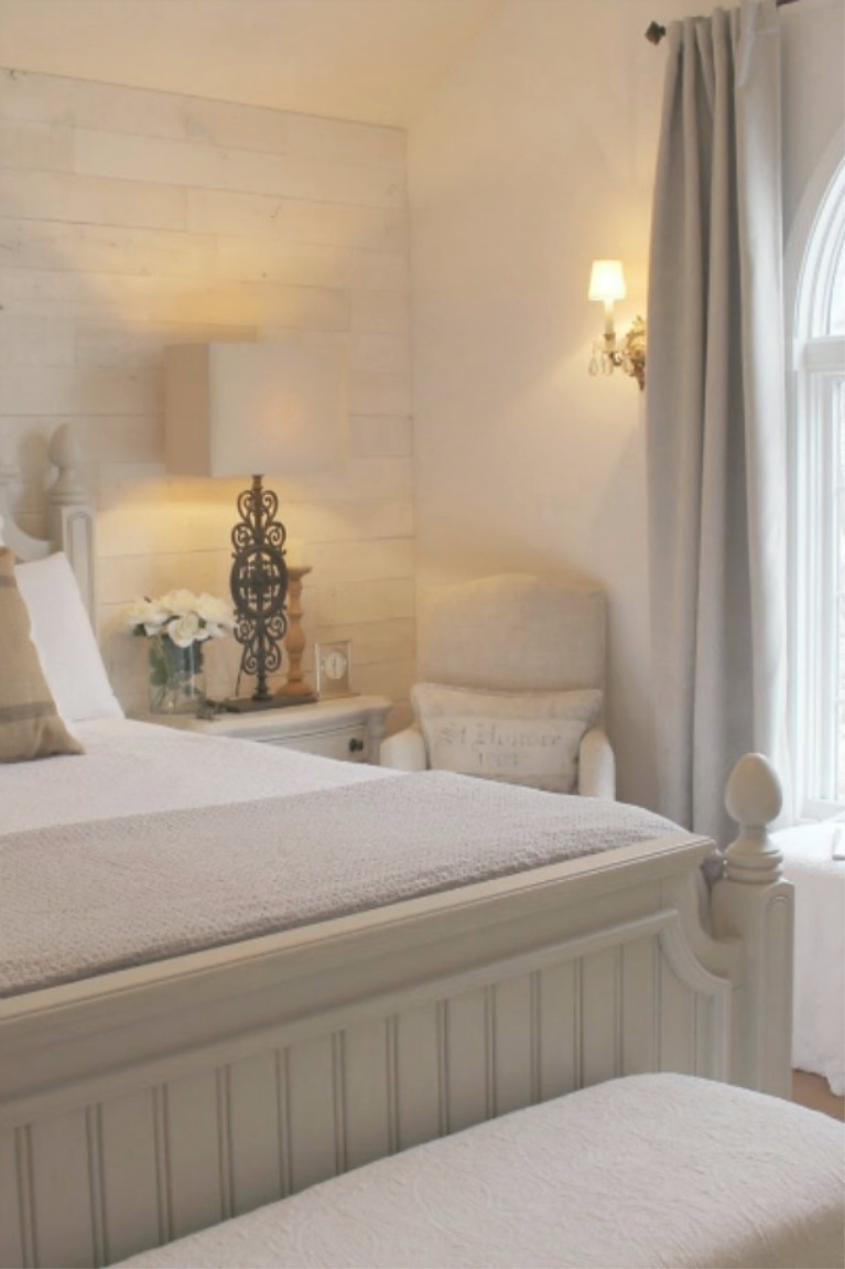 Serene French country cottage style bedroom with Stikwood Hamptons accent wall and white oak flooring. #hellolovelystudio #bedroomdecor #europeancountry #frenchcountry #frenchnordic #whitebedrooms #stikwood #hamptons #serenedecor