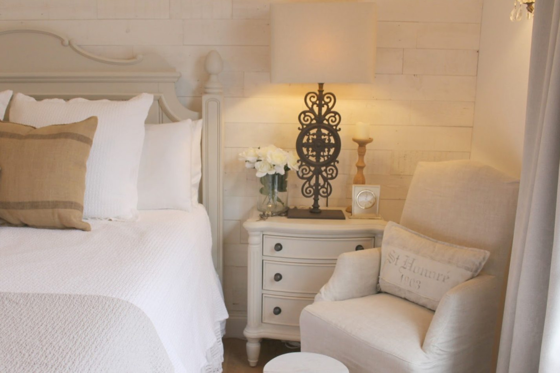 Serene French country cottage style bedroom with Stikwood Hamptons accent wall and white oak flooring. #hellolovelystudio #bedroomdecor #europeancountry #frenchcountry #frenchnordic #whitebedrooms #stikwood #hamptons #serenedecor