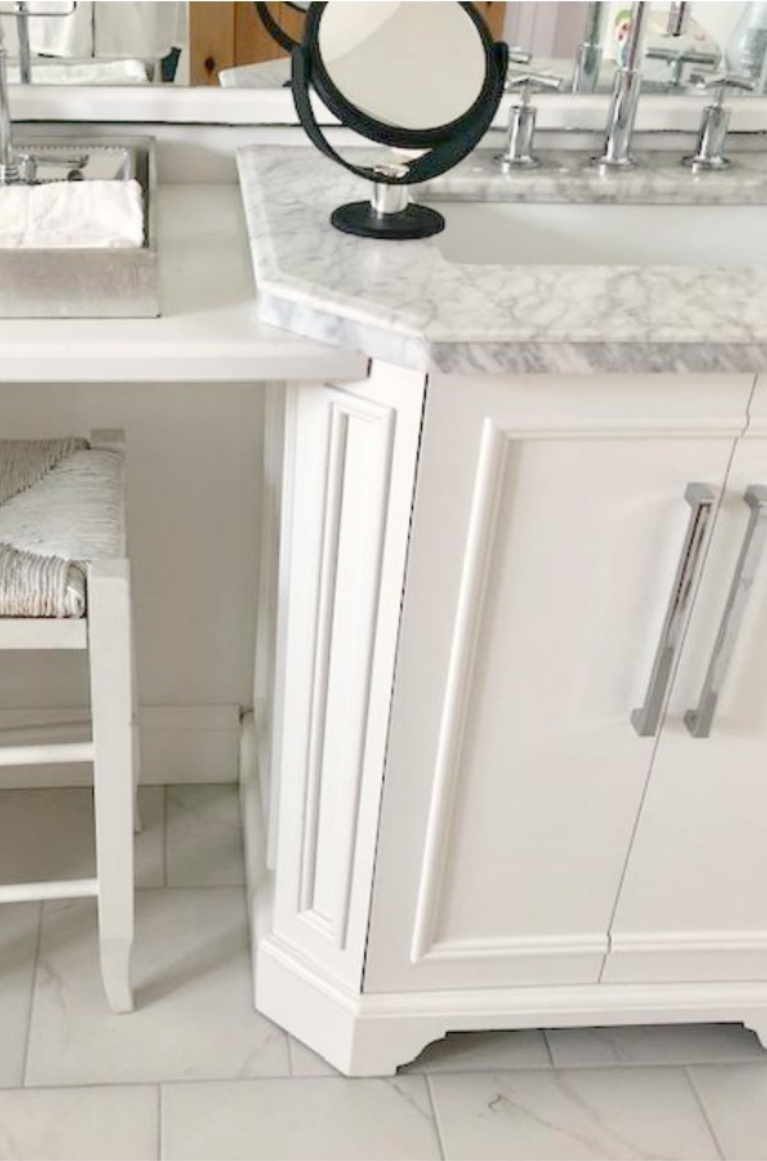 Detail of white vanity with carrara marble top in our French country bathroom. #hellolovelystudio #bathroomvanity #frenchcountry