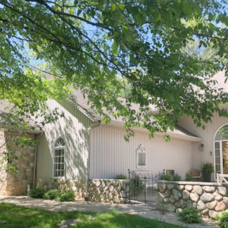 Wodsy exterior of our charming cottage sited on a hill with a front stone walled courtyard. #hellolovelystudio #cottageexterior #cozycottage