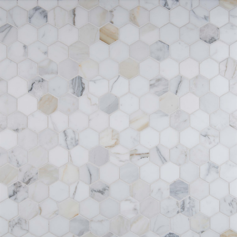 Calacatta Gold marble hex mosaic tile. #calacattagold #hextiles #marblemosaic