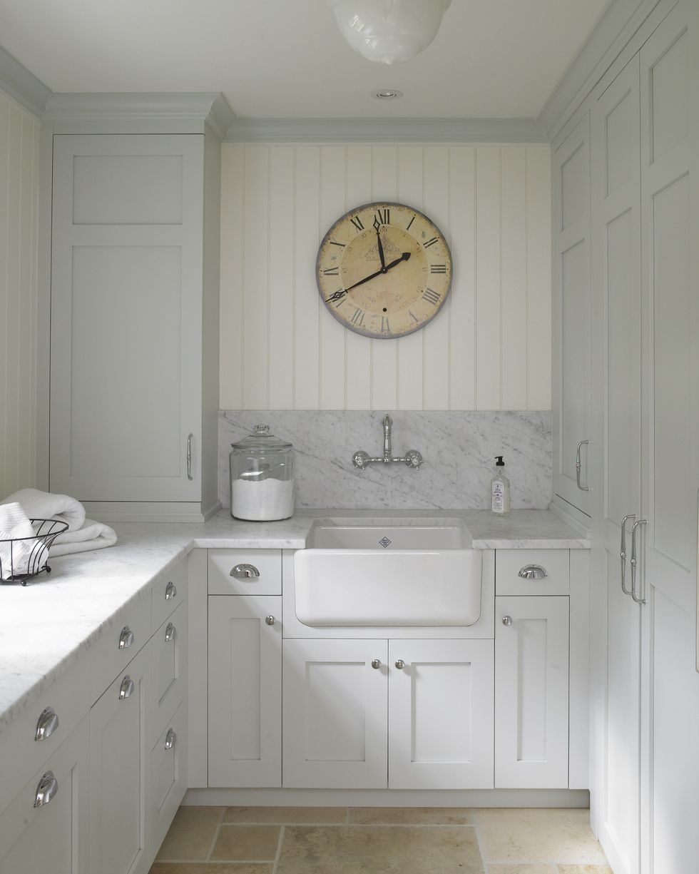 Classic English country laundry room with pale colors and a serene mood. Huestis Tucker Architects. Come enjoy Traditional Laundry Room and Mud Room Design Ideas, Resources, and Humor Quotes!