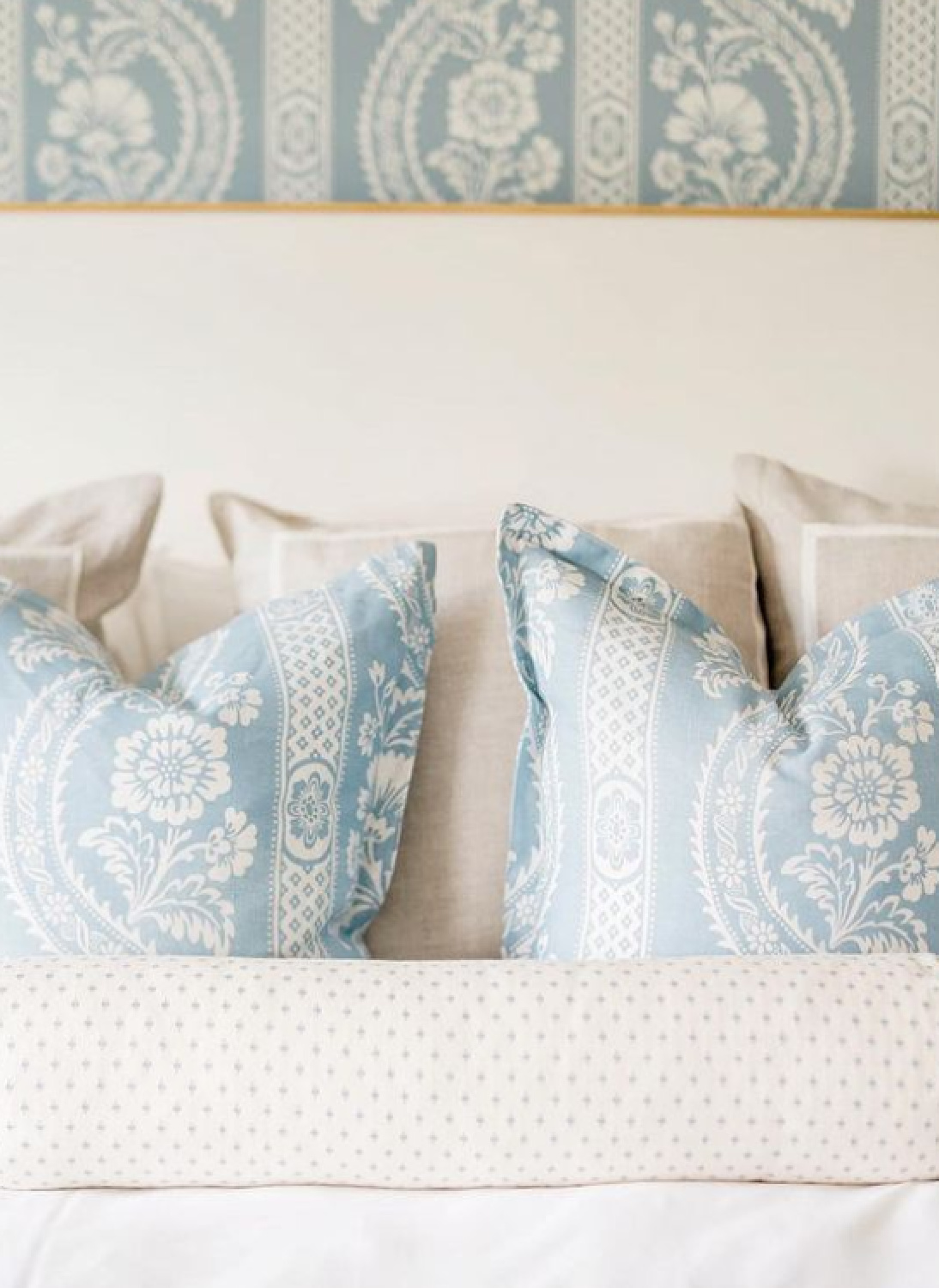 Timeless traditional interior design style in a blue wallpapered serene bedroom in Vermont by The Fox Group. #chambrayblue #bedroom #interiordesign