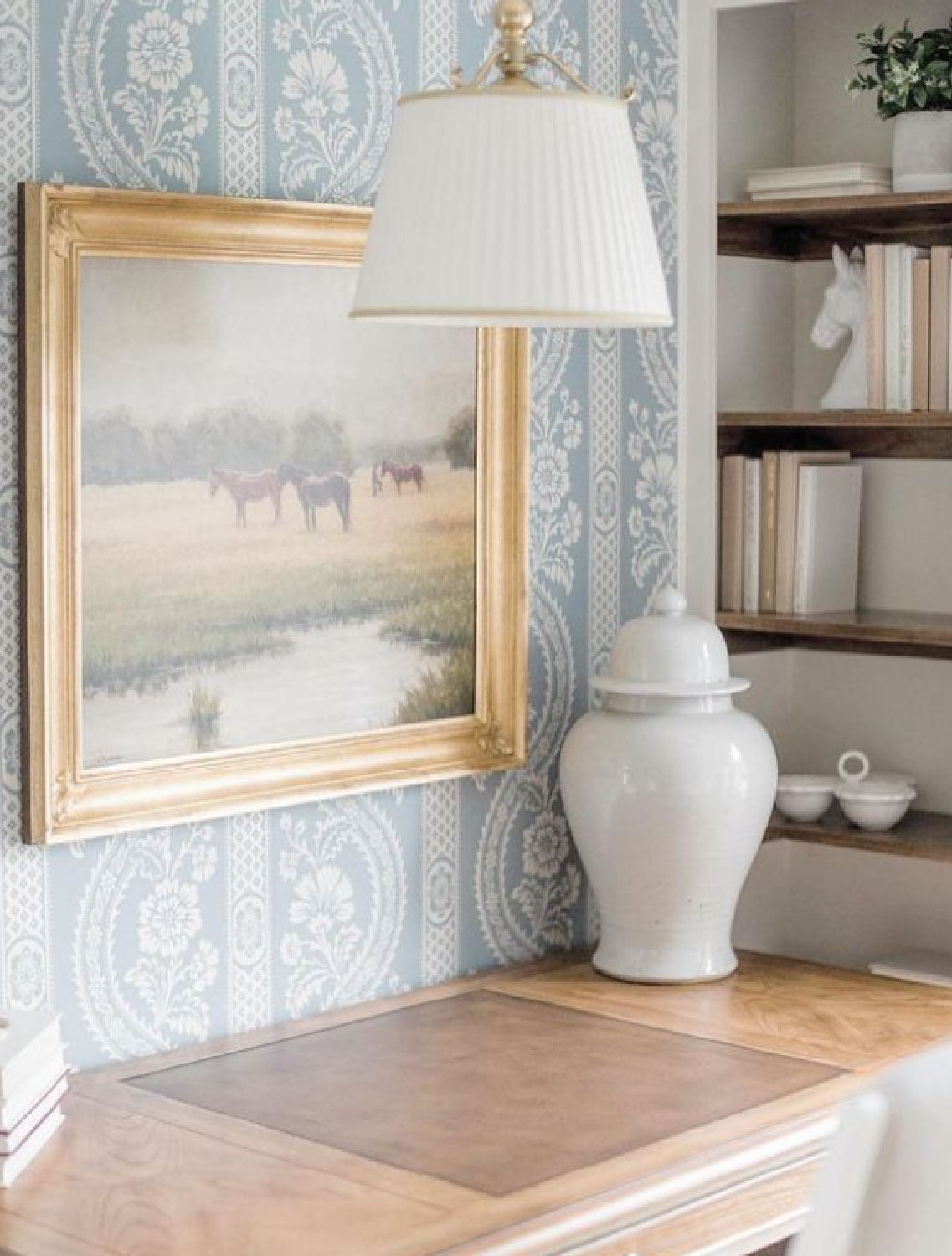 Timeless traditional interior design style in a blue wallpapered serene bedroom in Vermont by The Fox Group. #chambrayblue #bedroom #interiordesign