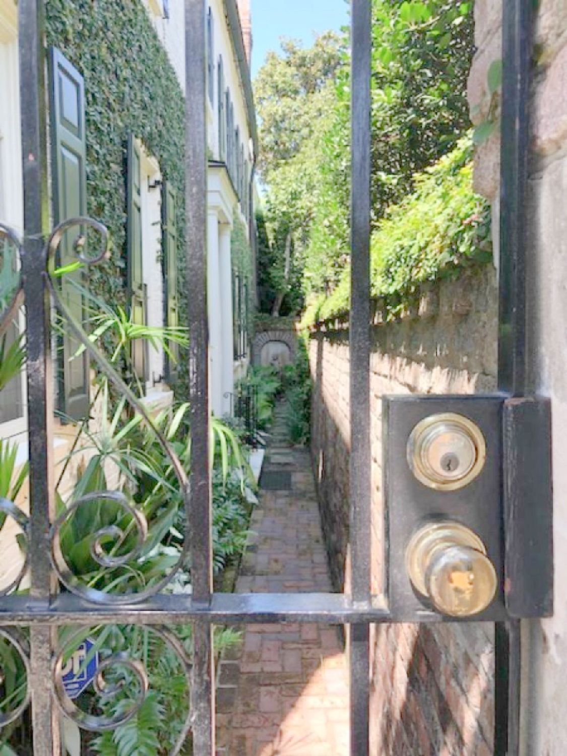 Charleston's charming historic district is graced with architecturally magnificent homes, secret gardens, lush window boxes, and colorful design inspiration. Come enjoy this photo gallery with Historic Charleston Mansion Exteriors on Hello Lovely Studio. #charlestonhomes #charlestongardens