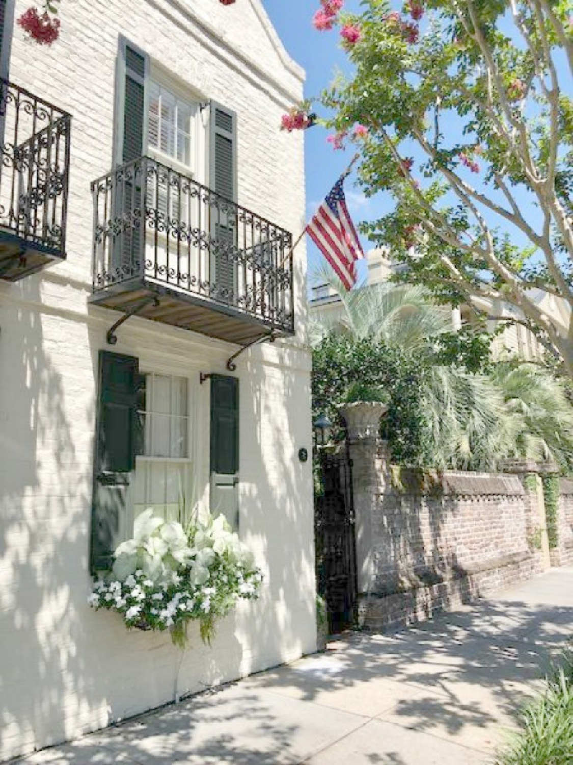 Charleston's charming historic district is graced with architecturally magnificent homes, secret gardens, lush window boxes, and colorful design inspiration. Come enjoy this photo gallery with Historic Charleston Mansion Exteriors on Hello Lovely Studio. #charlestonhomes #charlestongardens