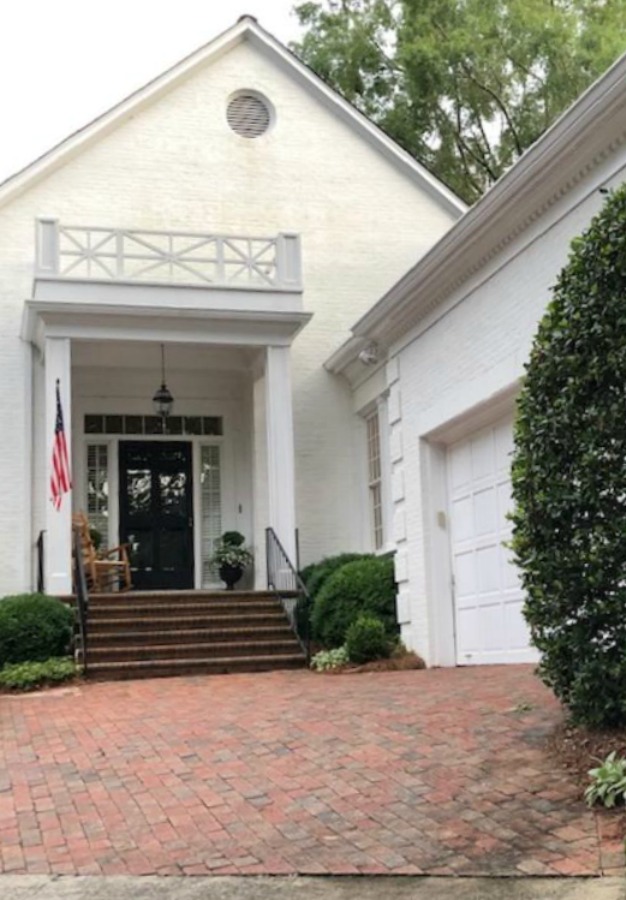 This charming home exterior in Charlotte, NC, boasts curb appeal, traditional design, and inspiring architectural details - Hello Lovely Studio.