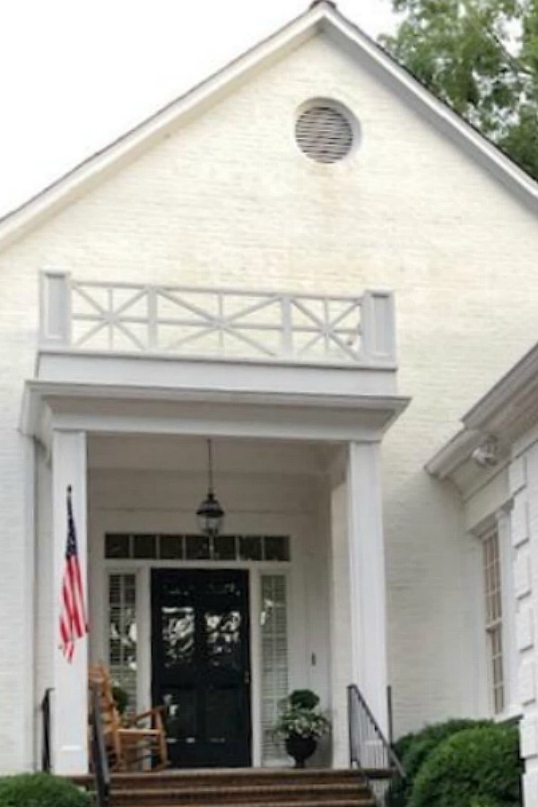 This charming home exterior in Charlotte, NC, boasts curb appeal, traditional design, and inspiring architectural details - Hello Lovely Studio.