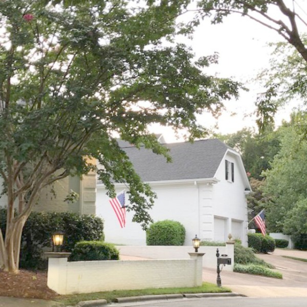 This charming home exterior in Charlotte, NC, boasts curb appeal, traditional design, and inspiring architectural details - Hello Lovely Studio.