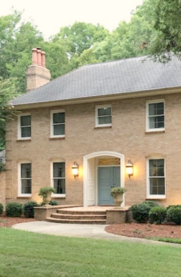 This charming home exterior in Charlotte, NC, boasts curb appeal, traditional design, and inspiring architectural details - Hello Lovely Studio.