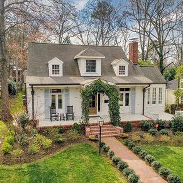 Charming white Cape Cod cottage in Charlotte has storybook cottage charm!