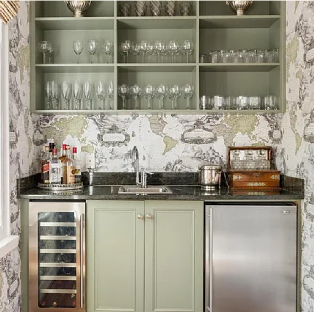 Gorgeous built-in wet bar with sage green cabinetry and wallpaper - located in Charleston's Dewar-Lee-Pringle house built in 1762. #charlestoninteriors #traditionalstyle #wetbar