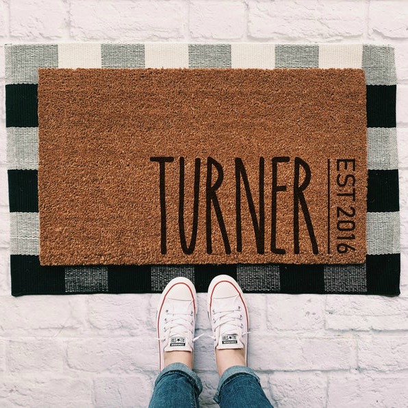 Only the best family gift for the holidays or engagement or newlywed gift! Personalized door mat with last name and anniversary. Rug layering is still adorable! #doormat #ruglayering