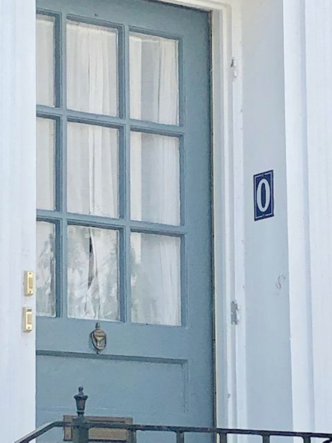 In the Battery area of Charleston, beautiful antebellum mansions with charming gardens, gates, and colorful front doors inspire with their curb appeal - Hello Lovely Studio