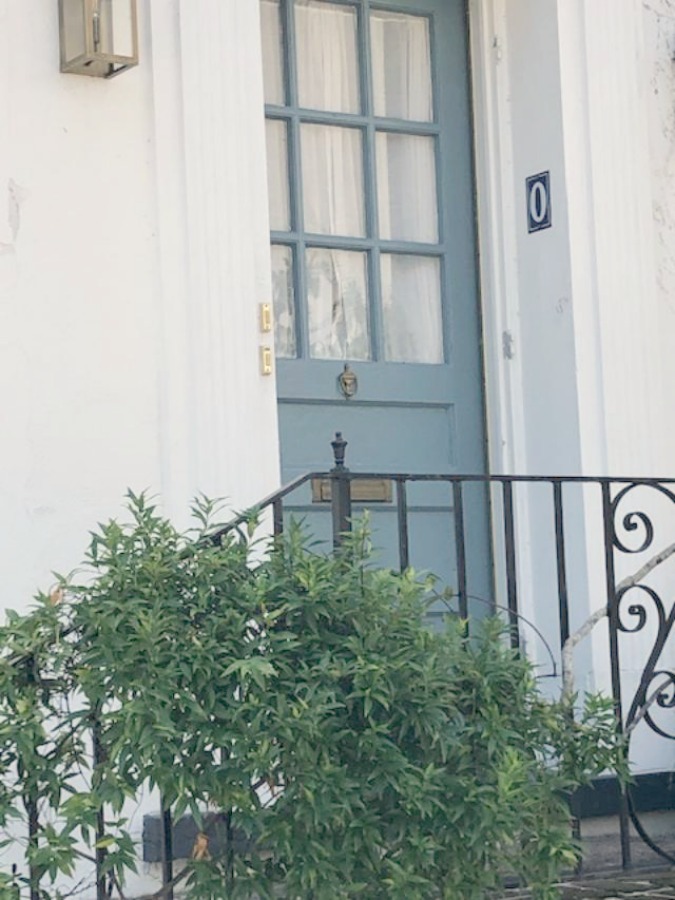 In the Battery area of Charleston, beautiful antebellum mansions with charming gardens, gates, and colorful front doors inspire with their curb appeal - Hello Lovely Studio