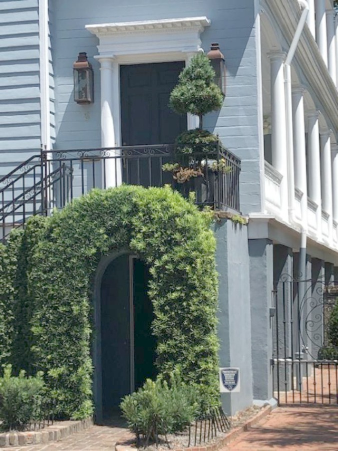 In the Battery area of Charleston, beautiful antebellum mansions with charming gardens, gates, and colorful front doors inspire with their curb appeal - Hello Lovely Studio