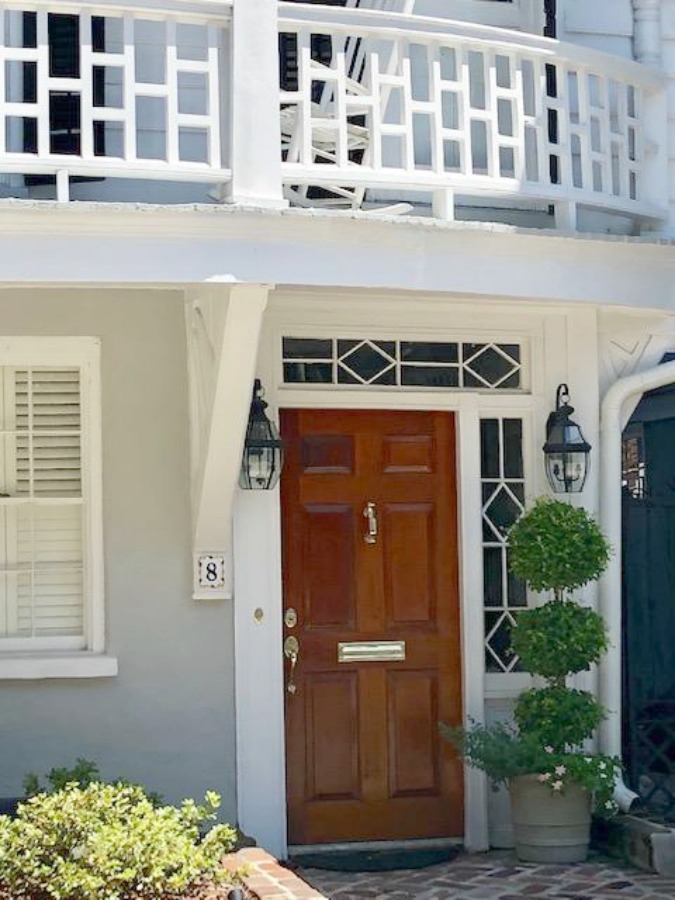 In the Battery area of Charleston, beautiful antebellum mansions with charming gardens, gates, and colorful front doors inspire with their curb appeal - Hello Lovely Studio