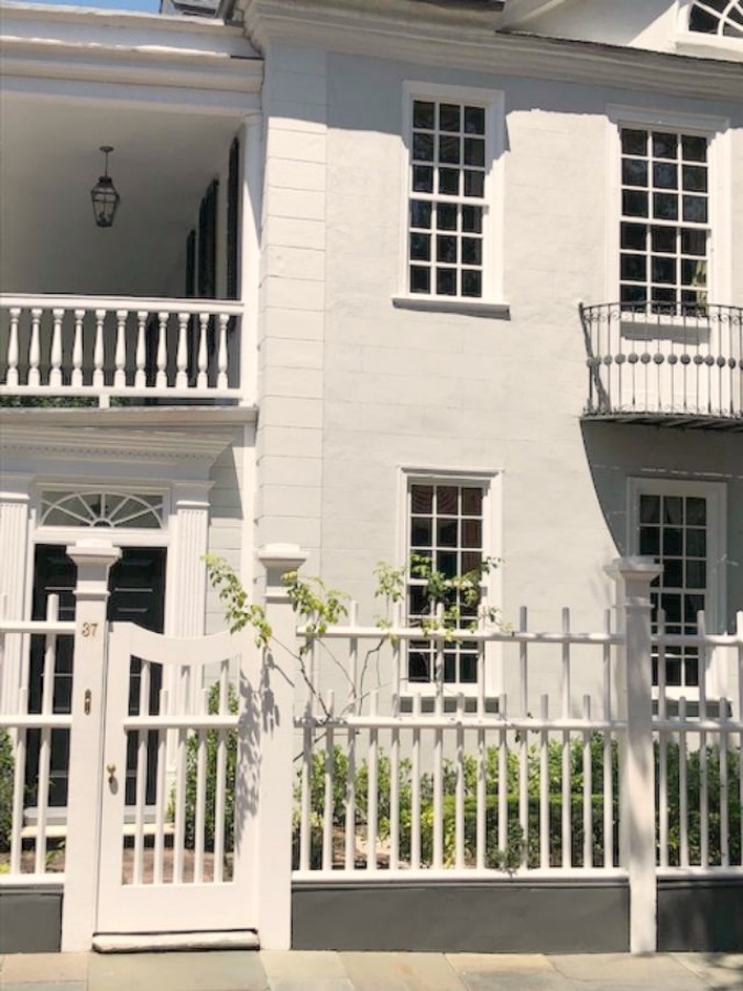 In the Battery area of Charleston, beautiful antebellum mansions with charming gardens, gates, and colorful front doors inspire with their curb appeal - Hello Lovely Studio