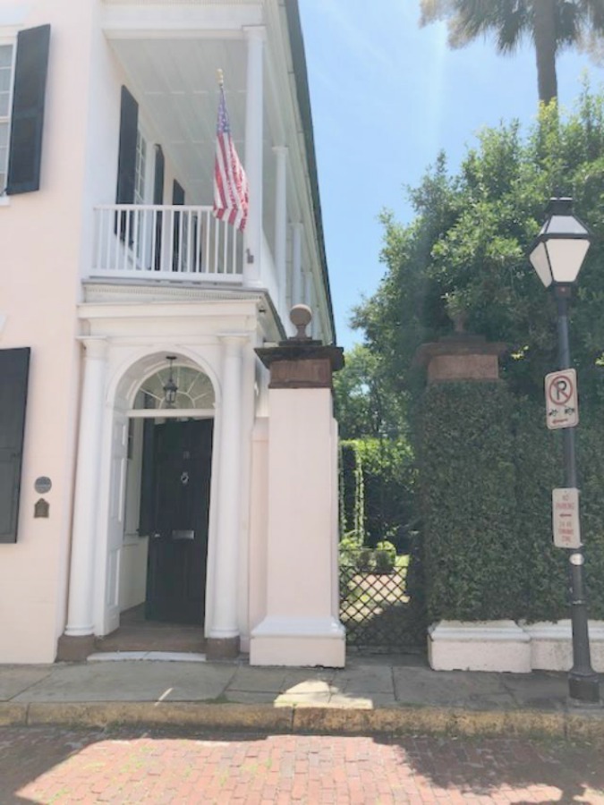 Charming downtown Charleston homes in the Battery are rich in architectural detail and traditional style! Photo by Hello Lovely Studio.