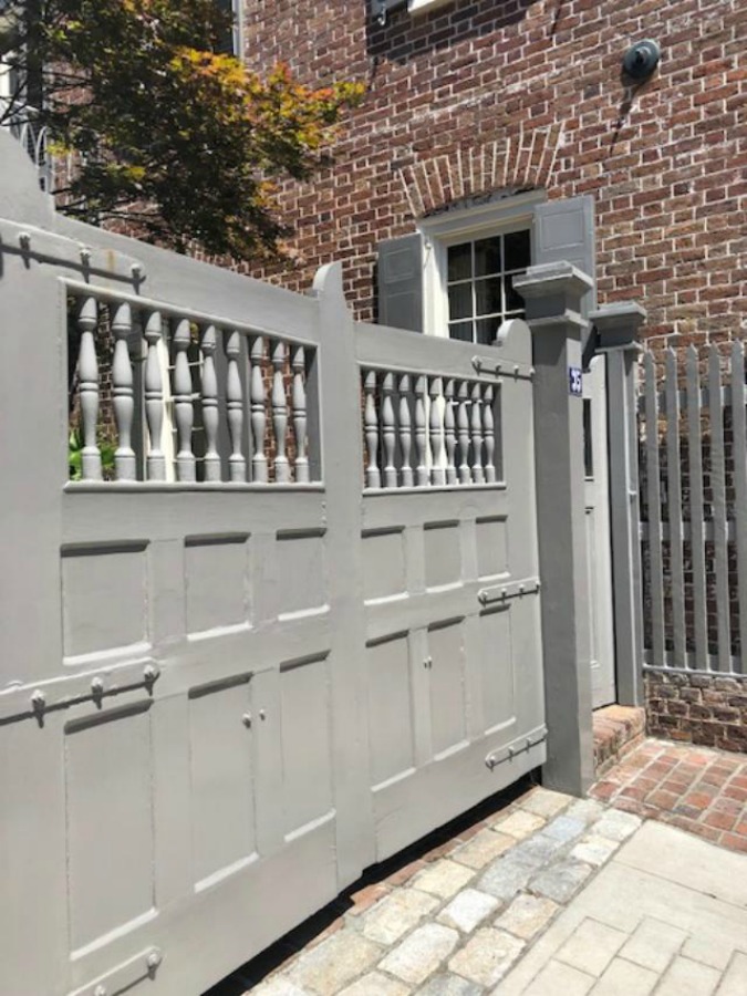 Charming downtown Charleston homes in the Battery are rich in architectural detail and traditional style! Photo by Hello Lovely Studio.