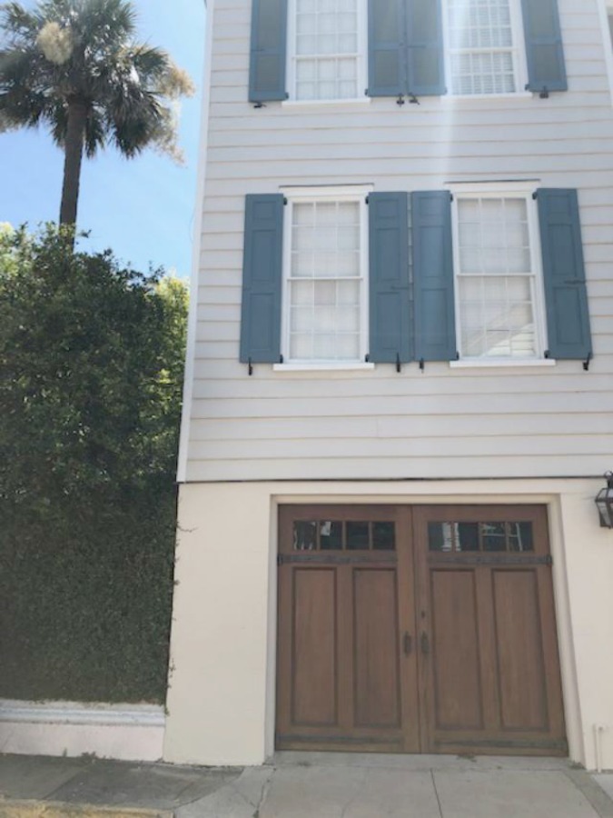 Charming downtown Charleston homes in the Battery are rich in architectural detail and traditional style! Photo by Hello Lovely Studio.