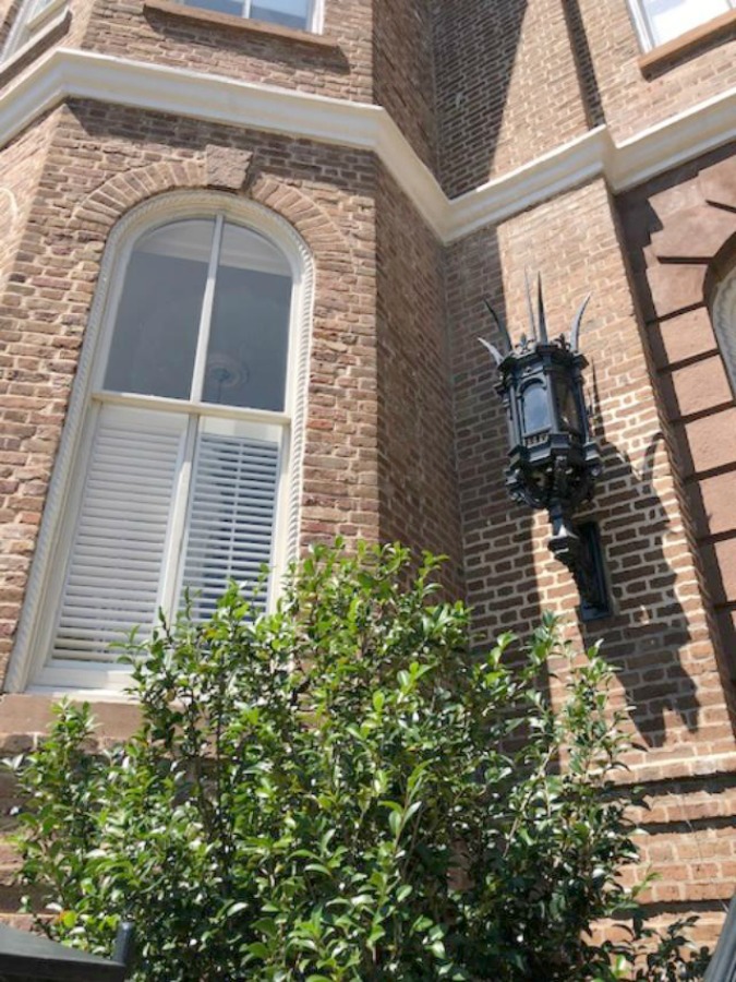 Charming downtown Charleston homes in the Battery are rich in architectural detail and traditional style! Photo by Hello Lovely Studio.