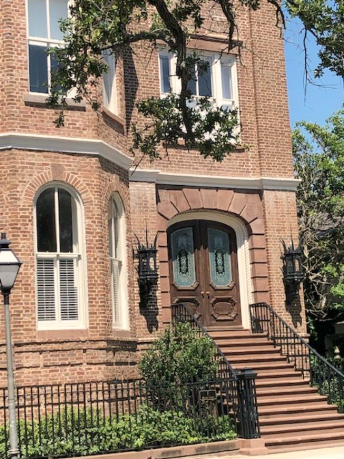 Charming downtown Charleston homes in the Battery are rich in architectural detail and traditional style! Photo by Hello Lovely Studio.