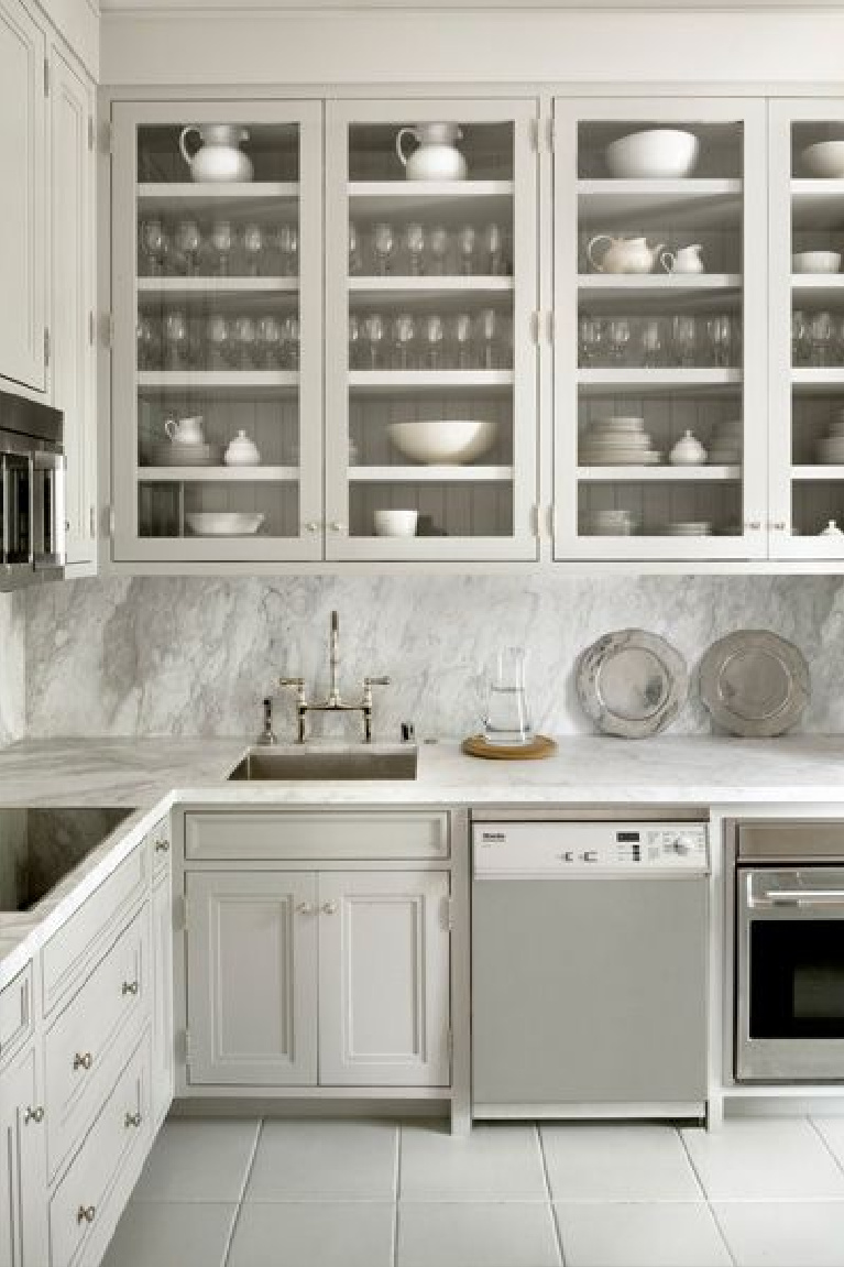 Pavilion Gray paint by Farrow & Ball on cabinets in a gorgeous kitchen by Cynthia Carlson Associates. #paviliongray #paintcolors #farrowandball #graykitchen #traditionalkitchendesign #bespokekitchens