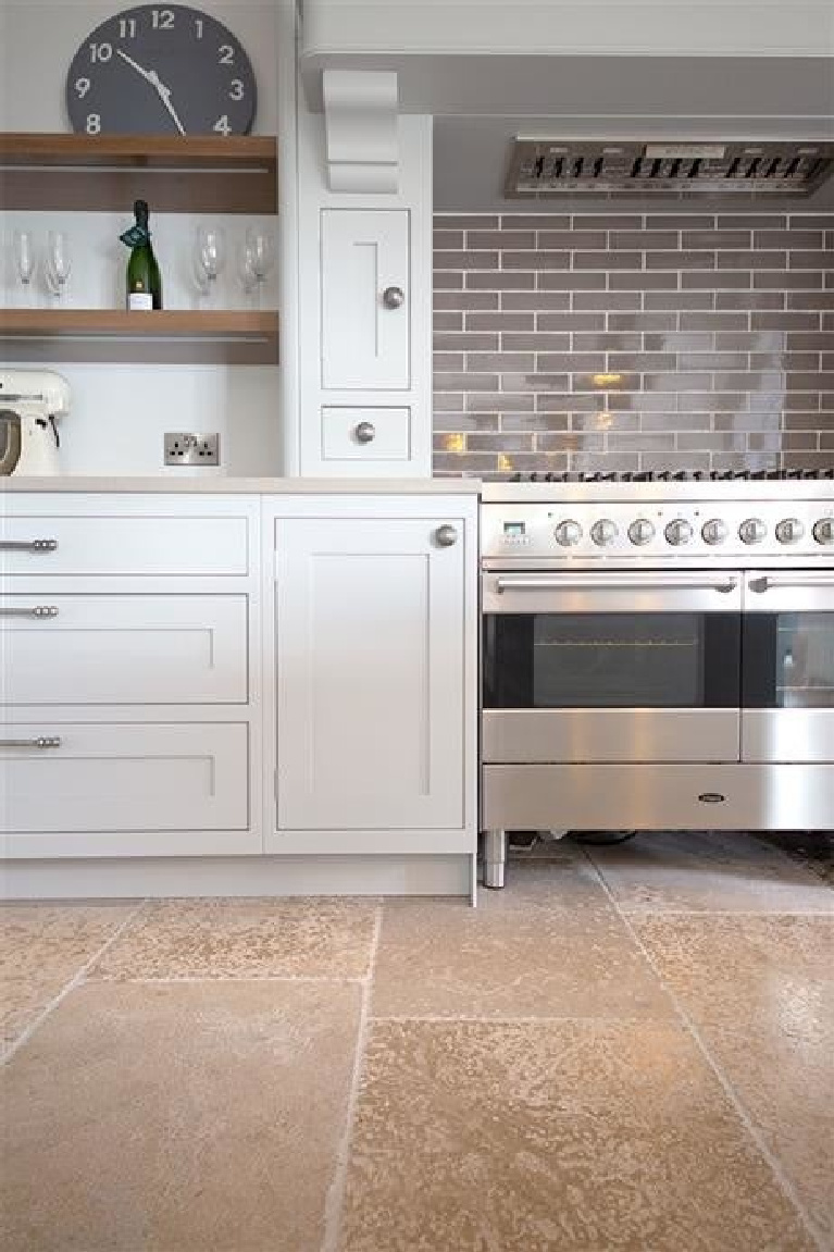 Pavilion Gray painted kitchen cabinets in a lovely kitchen with Shaker style. #farrowandball #paintcolors #paviliongray #kitchencabinets #graykitchen #kitchendesign