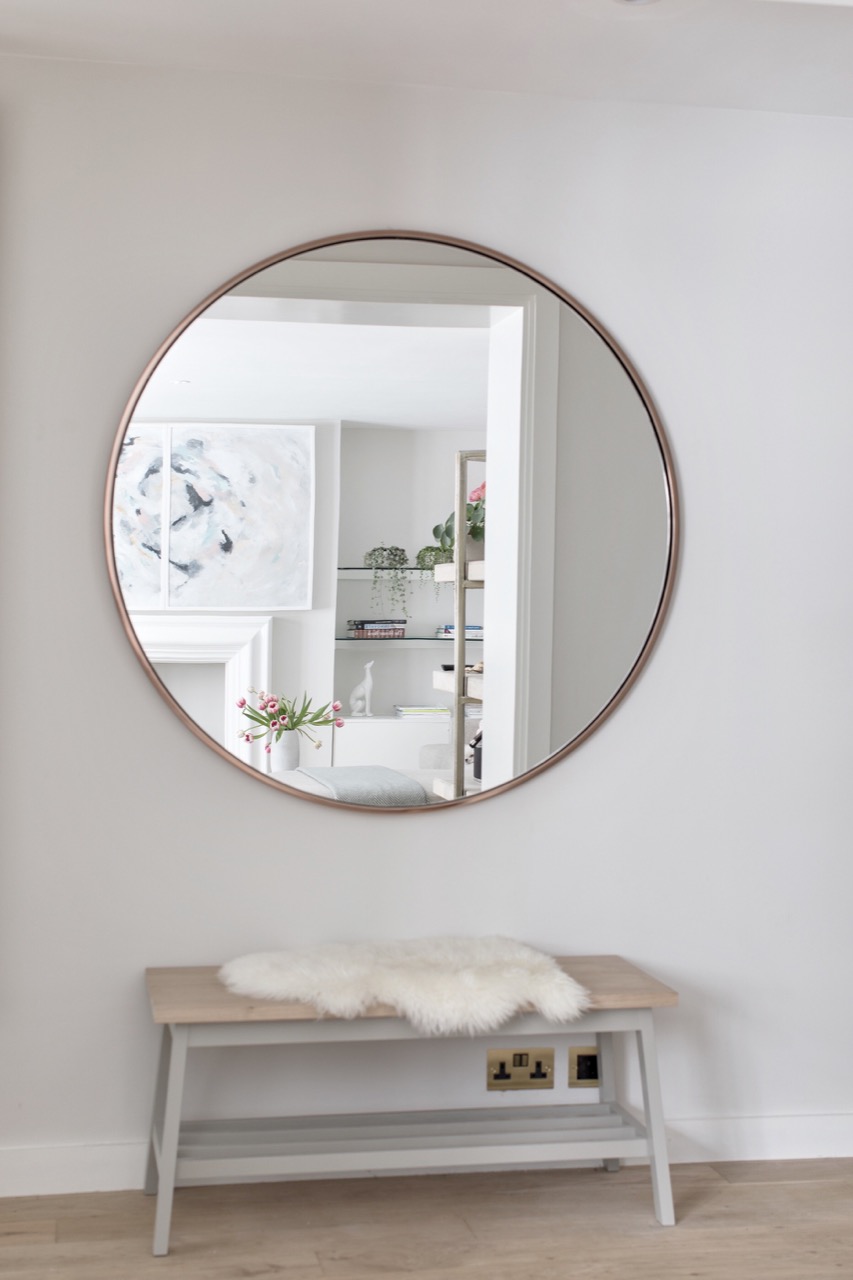 Farrow & Ball Strong White paint color on walls of a beautifully designed Notting Hill flat by Laura Butler Madden. Come score ideas for 16 Amazing Serene Paint Colors Interior Designers Use for a Soothing Vibe.