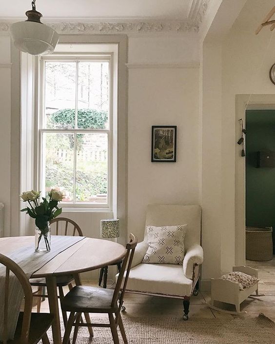 Farrow & Ball Wimborne White paint color on walls in a beautiful dining room in Ireland by Homestead. Score ideas and inspiration for white country interiors in this beautiful post.