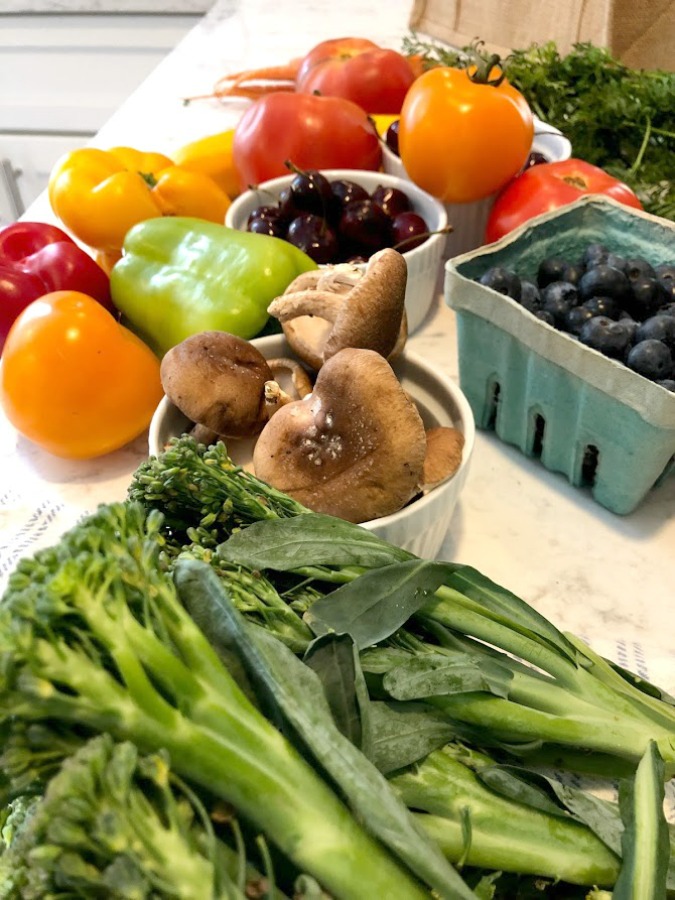 Fresh vegetables and fruit from the farmer's market in summer - Hello Lovely Studio.