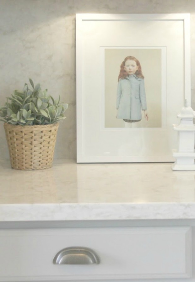 As real life renovators, we made over our ugly Arizona kitchen with no demo or dust with smart upgrades and swaps. Light grey cabinets, Viatera quartz counters (Soprano), and calacatta marble hex accent wall - Hello Lovely studio.