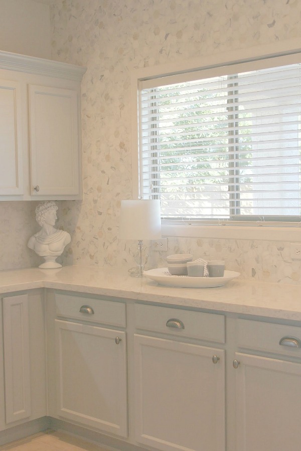 As real life renovators, we made over our ugly Arizona kitchen with no demo or dust with smart upgrades and swaps. Light grey cabinets, Viatera quartz counters (Soprano), and calacatta marble hex accent wall - Hello Lovely studio.