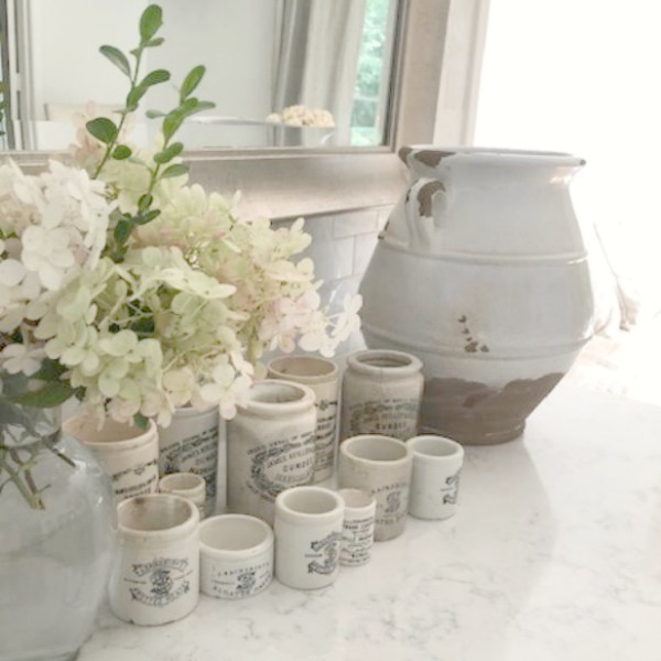 A mix of whites in my timelessly tranquil kitchen with European country decor, Viatera Minuet quartz, and Belgian linen - Hello Lovely Studio.