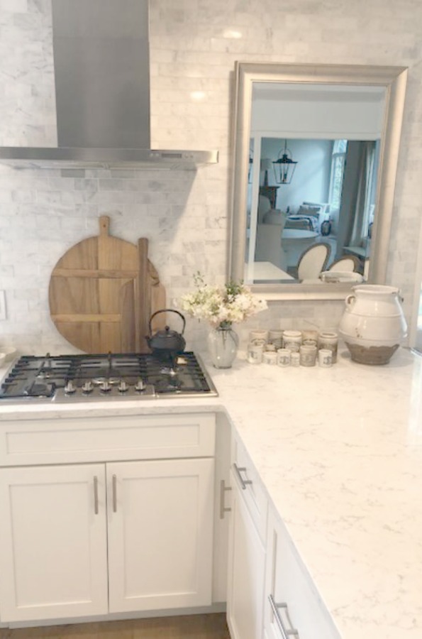 A mix of whites in my timelessly tranquil kitchen with European country decor, Viatera Minuet quartz, and Belgian linen - Hello Lovely Studio. COME SEE Timeless Kitchen Design Ideas and Decor to Freshen Your Traditional, Farmhouse, as well as French Country Kitchen.