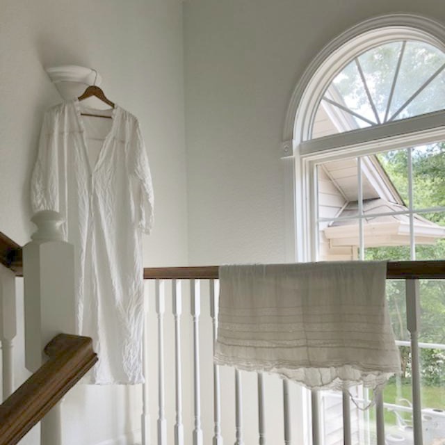 Antique white cotton clothing drying in the sun - Hello Lovely Studio.