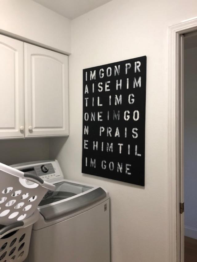 Before pic of laundry room in fixer upper.