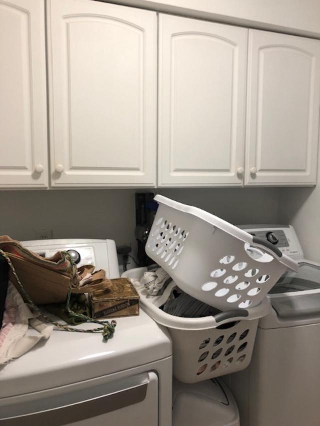 Before pic of laundry room in fixer upper.