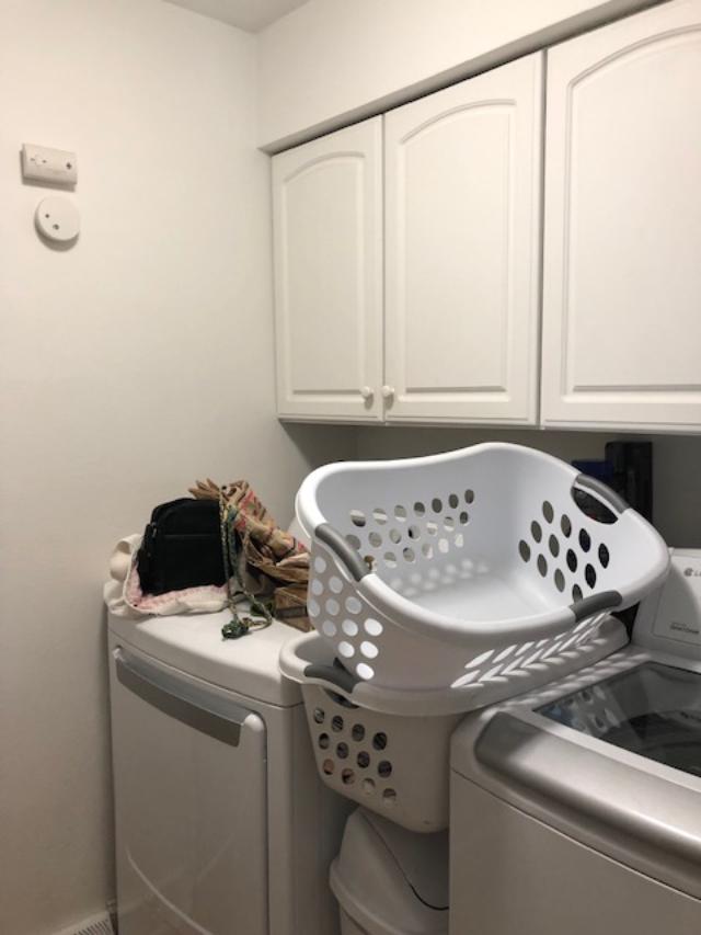 Before pic of laundry room in fixer upper.