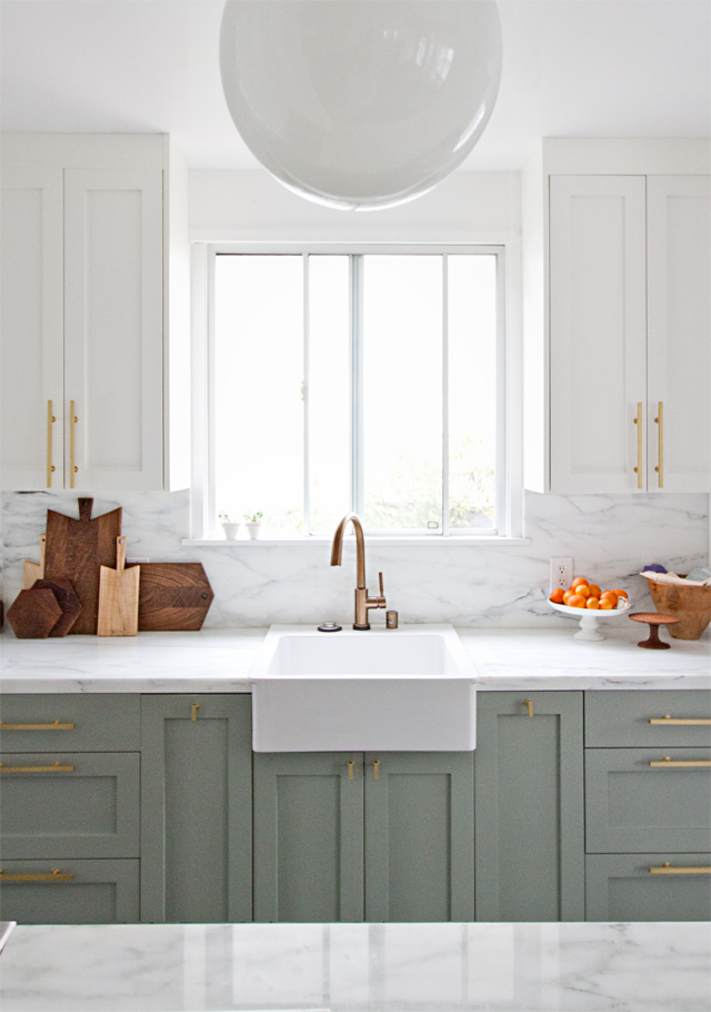 Sarah Sherman Samuel's kitchen renovation is a relevation with Wimborne White painted upper cabinets (Farrow & Ball).