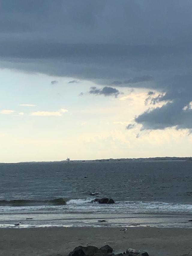 Twilight on the beach. Sullivan's Island is both a town and an island, an affluent suburb of Charleston., South Carolina - Hello Lovely Studio.