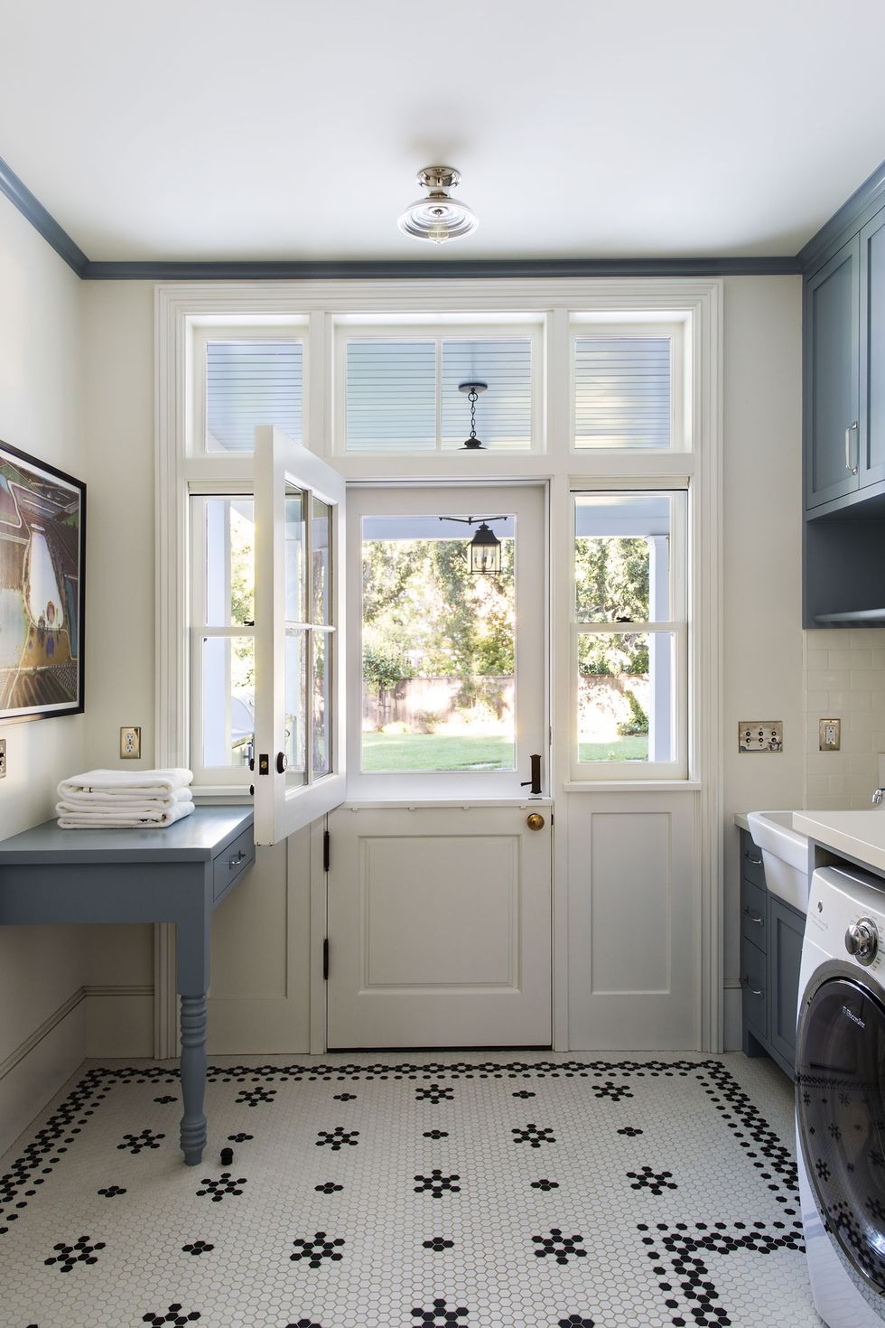 quadrille-arbor-de-matisse-blue-white-wallpaper-mudroom-laundry-room-utility-dog-bowls-indigo-home-baskets  - The Glam Pad