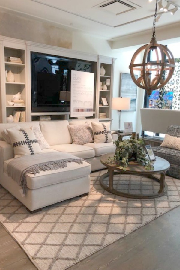 Beautiful upholstered pieces at Arhaus made in the USA have timeless charm and European sensibility for a high end look - Hello Lovely Studio.