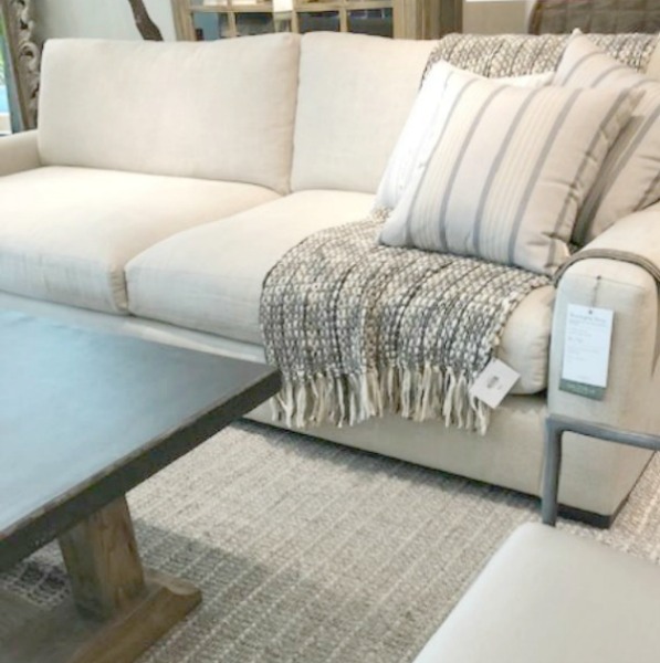 Beautiful upholstered pieces at Arhaus made in the USA have timeless charm and European sensibility for a high end look - Hello Lovely Studio.