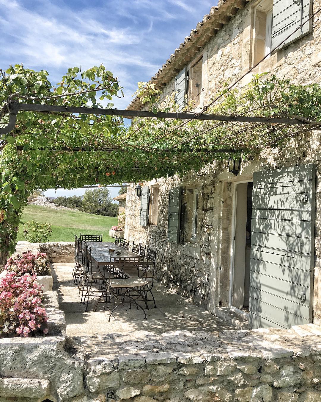 Charming stone exterior of a farmhouse in France - photo by Vivi et Margot.