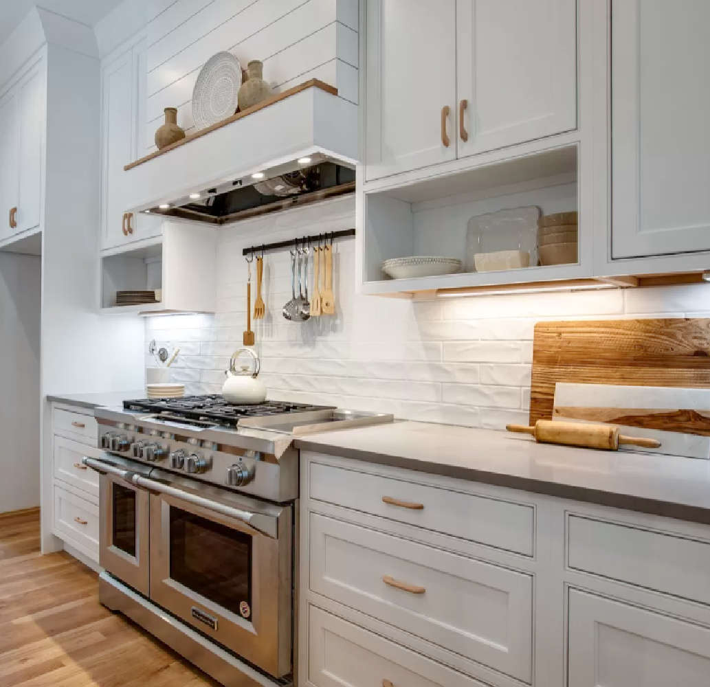 Beautiful Shaker kitchen with pro range and textured white ceramic backsplash. #whitekitchens #kitchendesign