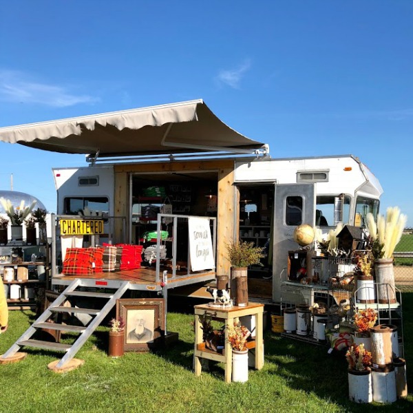 Vintage camper! Autumn inspiration, Fall farmhouse style decor, vintage wares, and handmade treasures mingle at Main Street Market (Urban Farmgirl) in Belvidere, Illinois - Hello Lovely Studio. #fleamarket #farmhousestyle #vintage #junkin