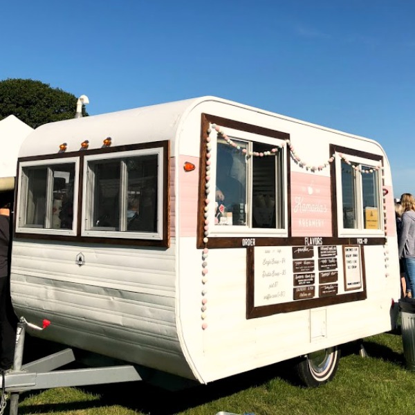 Vintage camper! Autumn inspiration, Fall farmhouse style decor, vintage wares, and handmade treasures mingle at Main Street Market (Urban Farmgirl) in Belvidere, Illinois - Hello Lovely Studio. #fleamarket #farmhousestyle #vintage #junkin